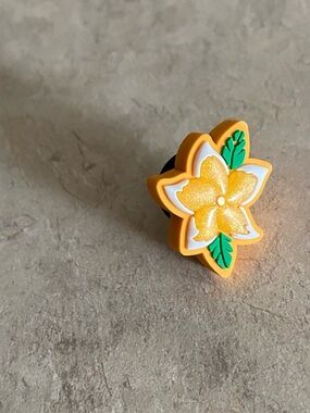Crocs Jibbitz Tropical Flower orange sparkly flower croc charm